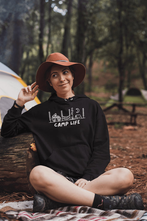 Introducing the ultimate companion for your outdoor adventures: the Camp Life Hoodie. Designed for those who find solace under the stars and joy by the campfire, this hoodie encapsulates the essence of camping. Featuring a picturesque camping scene that speaks directly to the heart of outdoor enthusiasts